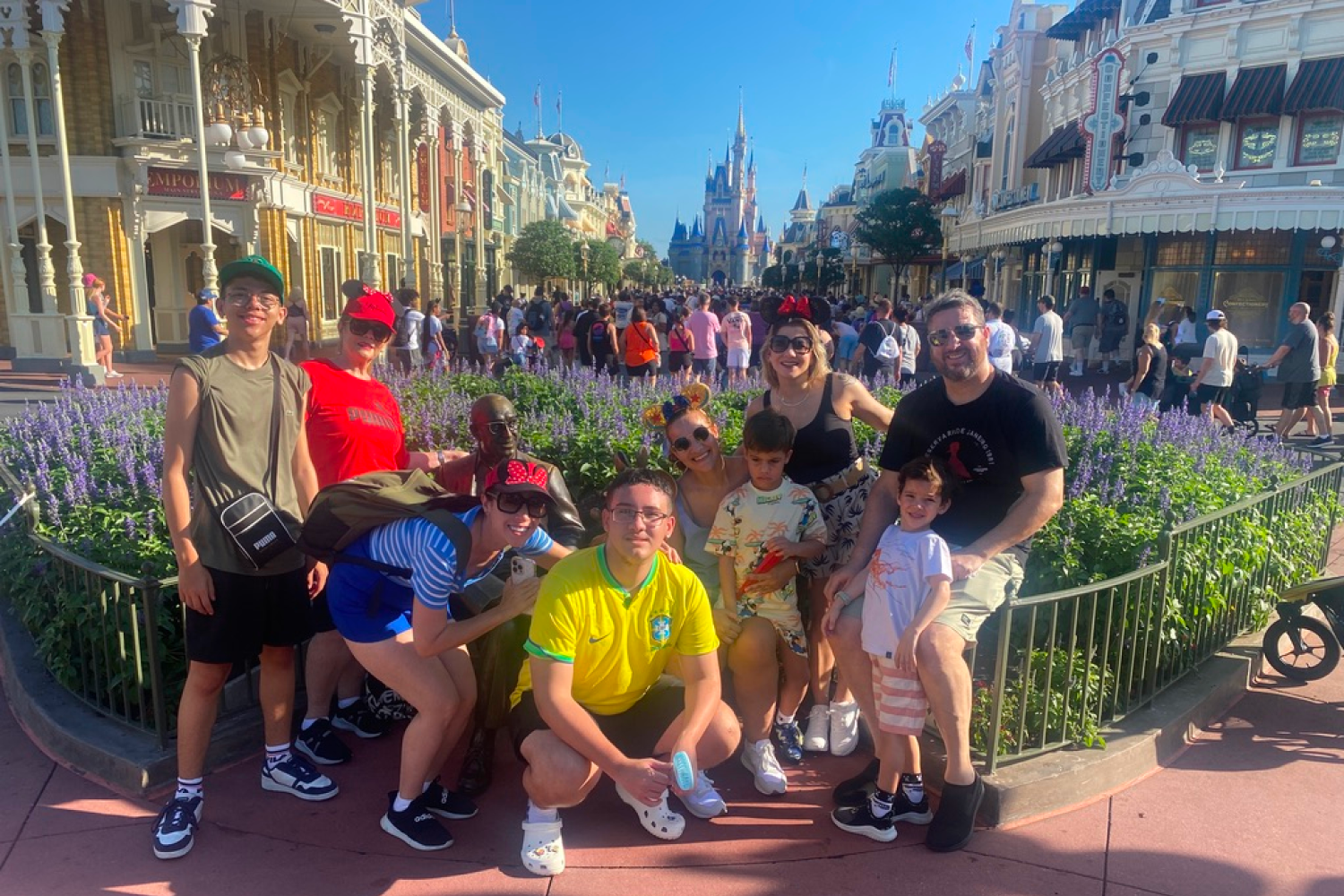 Family photo with the background showing the Magic Kingdom castle