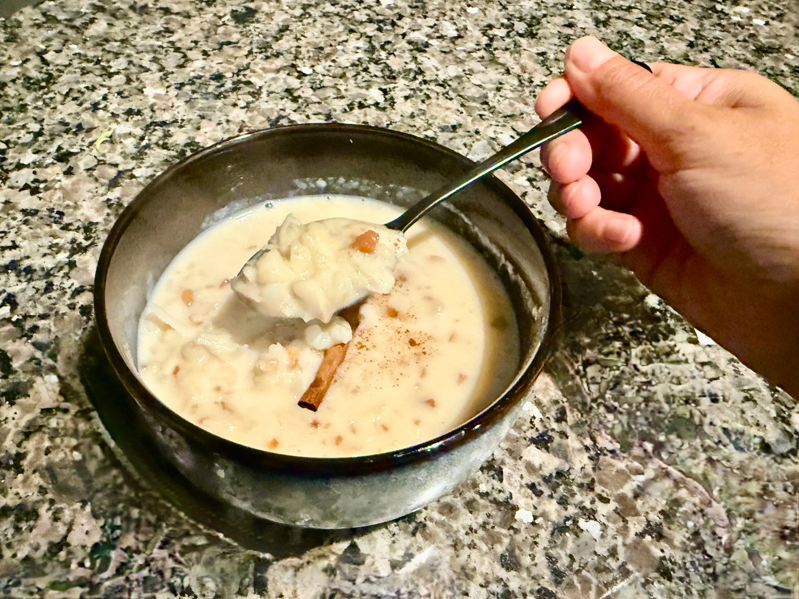 A bowl with creamy corn dessert