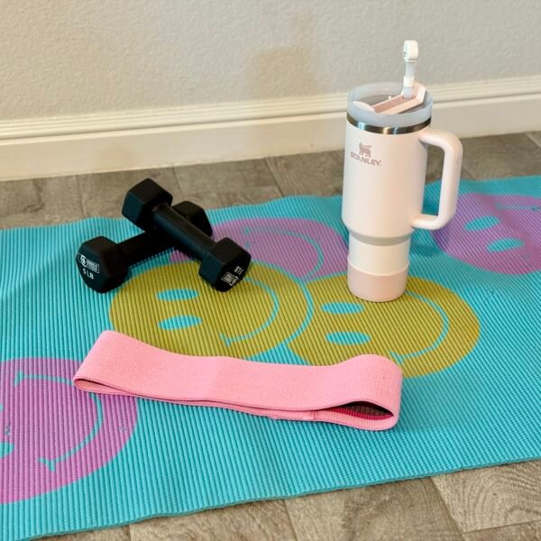 weight in the floor and a yoga mat