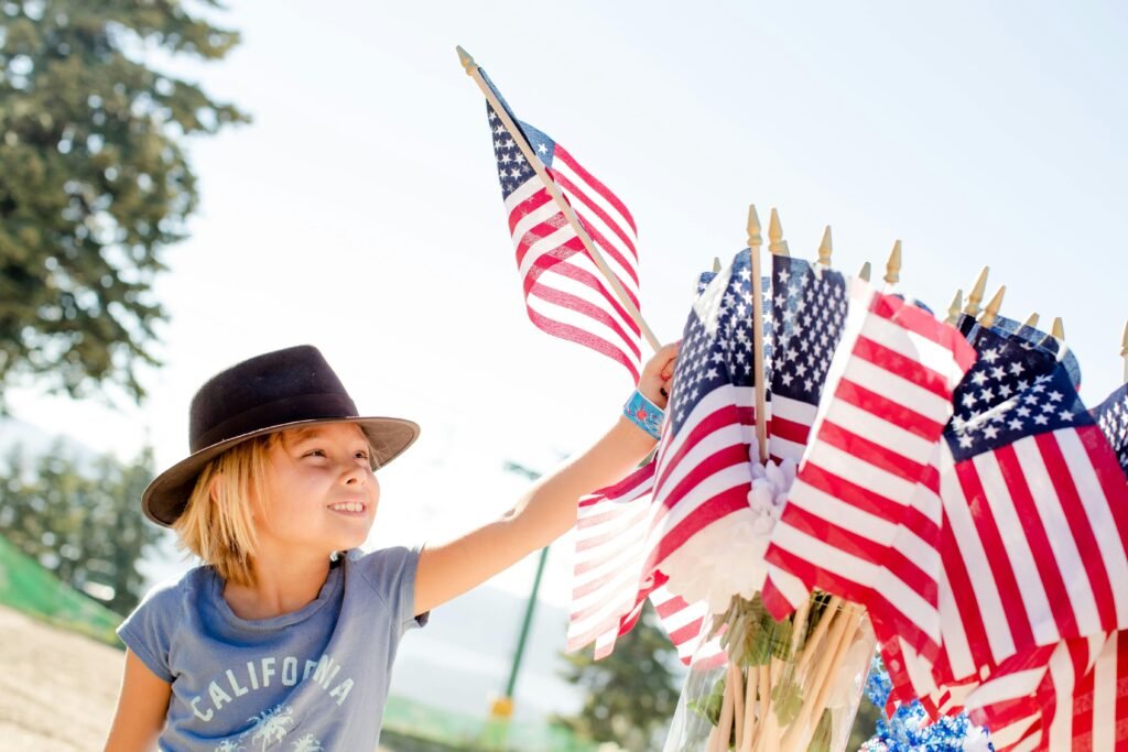 children-celebration Child with a American's flag in his hand.