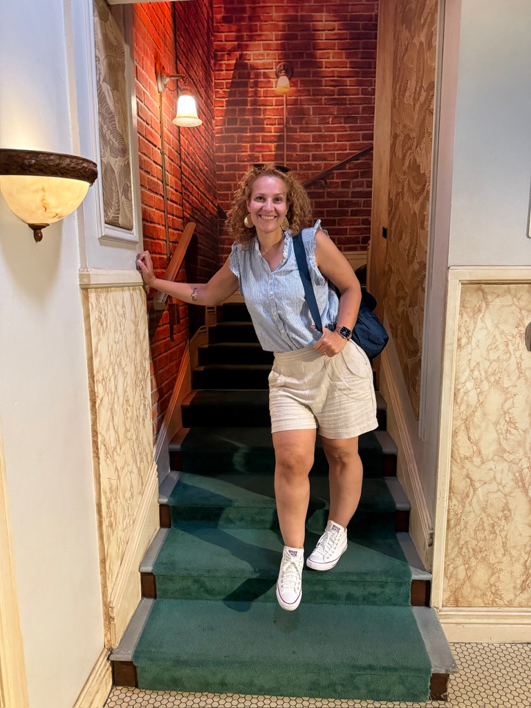day-3 Outfit transition from casual shorts and sandals to sneakers at Warner Bros. Studios