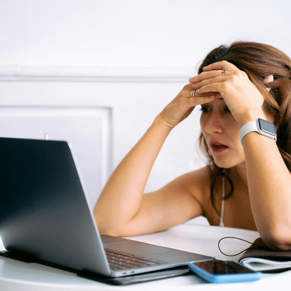 Focused woman working at a desk, symbolizing hard days.