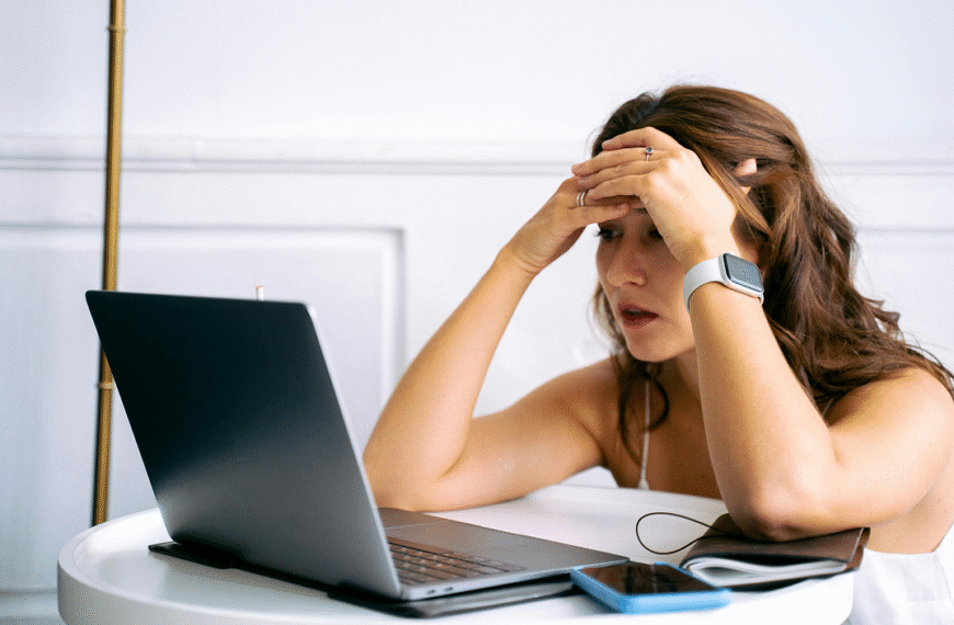Focused woman working at a desk, symbolizing hard days.