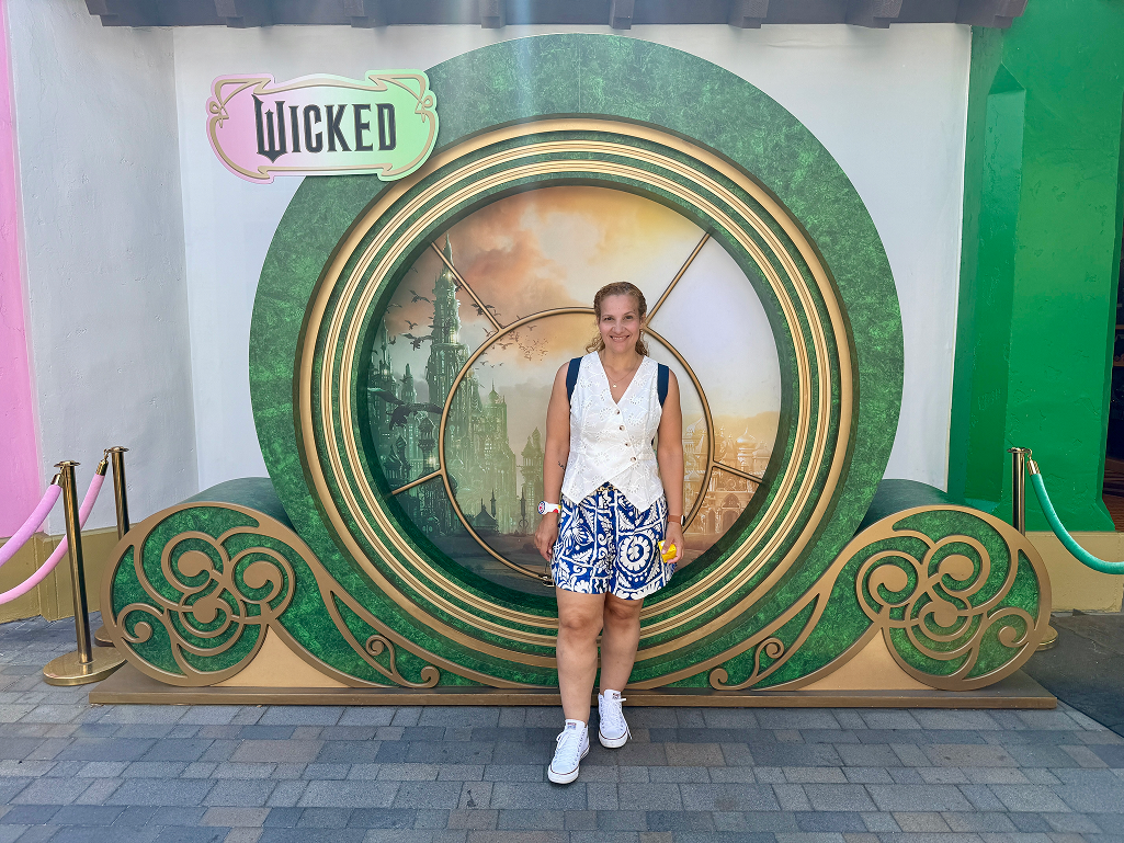 Confident 40-year-old woman outdoors, embracing life with lipedema and self-compassion.