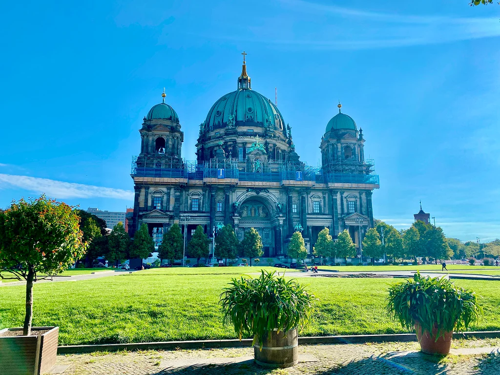 Berlin Cathedral with its green dome refle