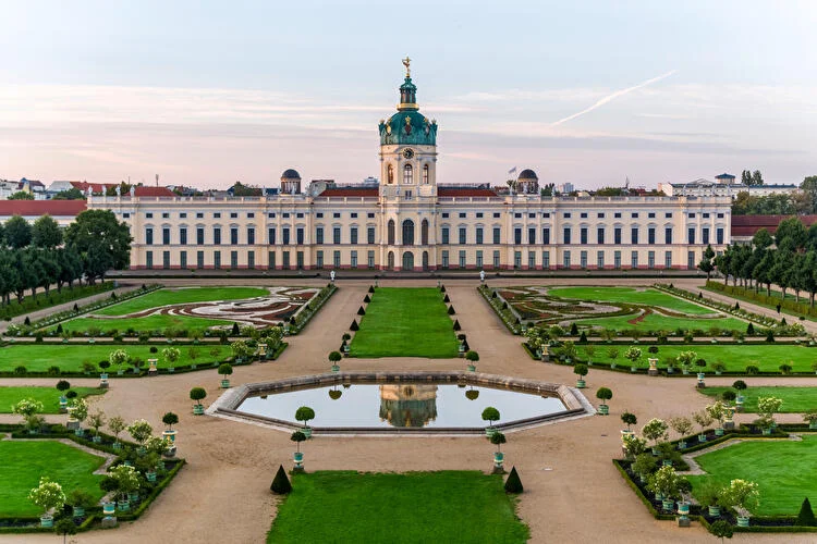 Baroque Charlottenburg Palace with symmetrical gardens in Berlin.