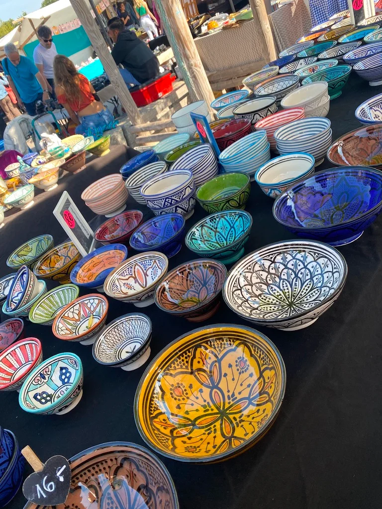 Vintage and second-hand items on display at Mauerpark flea market.