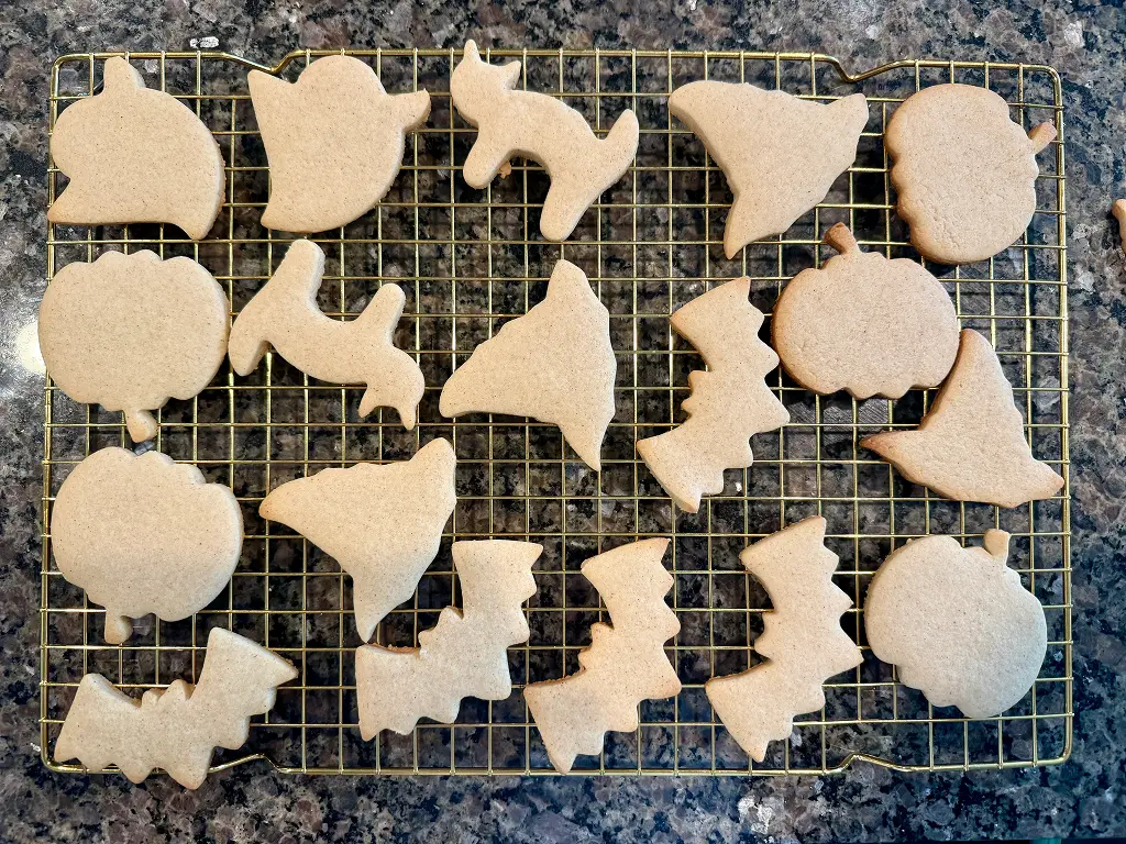 Baked halloween cookies with the edges golden.