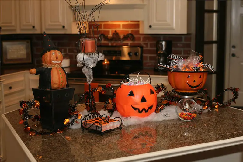 Halloween Party at home: table with halloween treats.