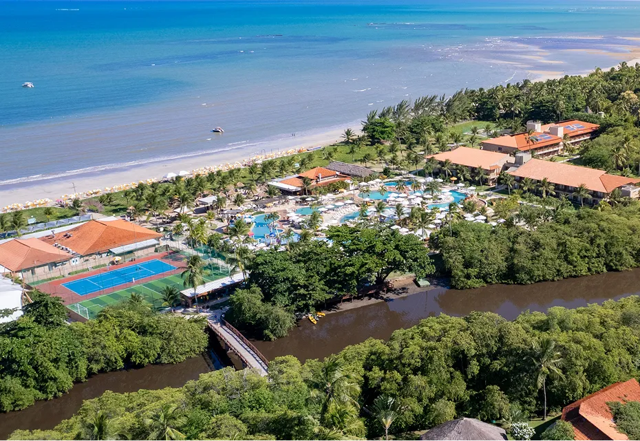 View of the hotel complex with buildings and gardens