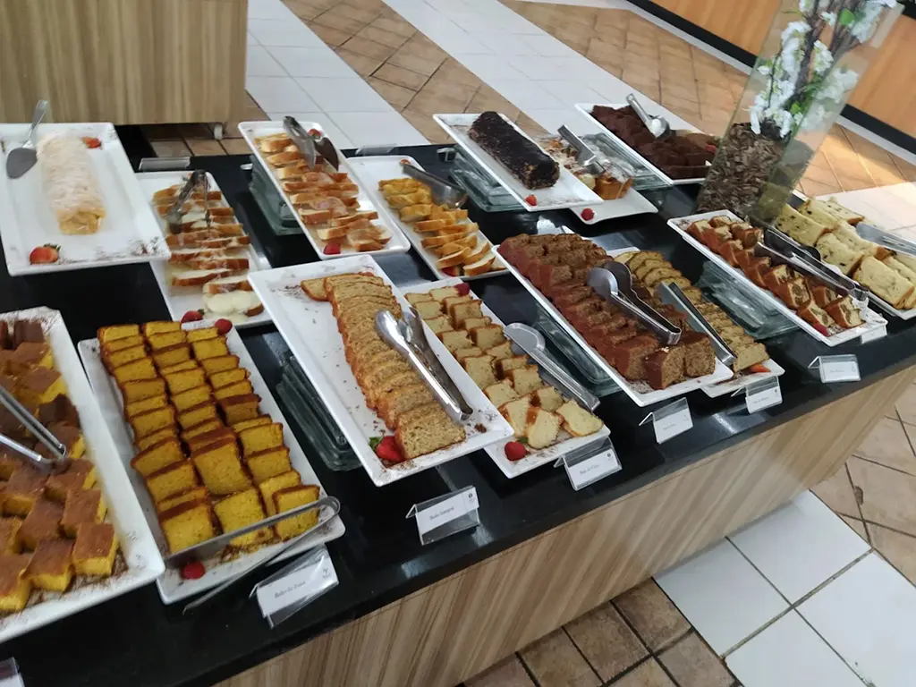 Brazilian Resorts: Breakfast table with a variety of cakes at the resort buffet